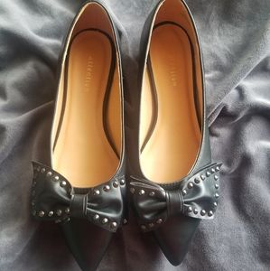 Black bow studded flats
